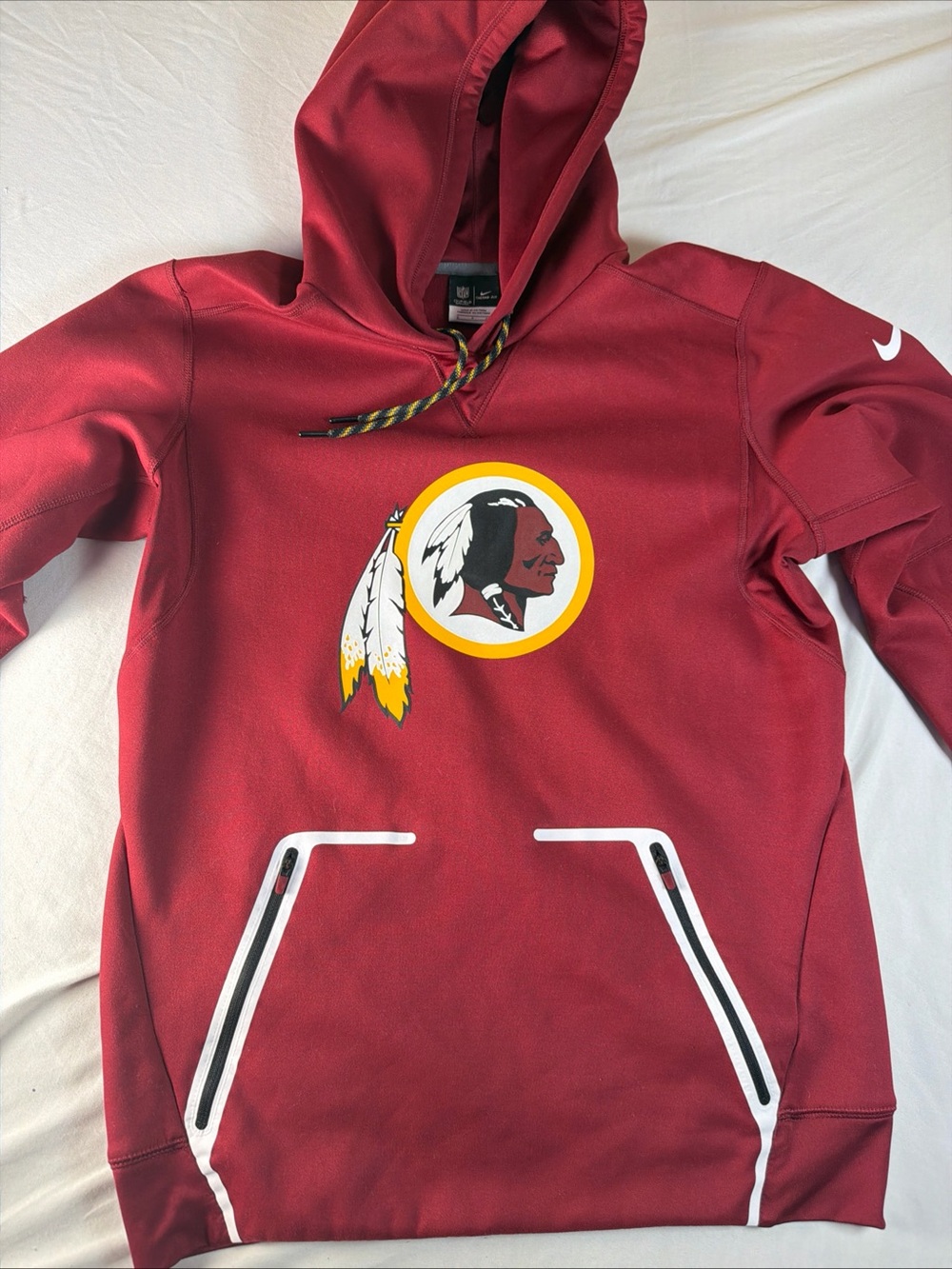 NFL Men's Burgundy Pullover Hoodie with
Washington Commanders Team Emblem